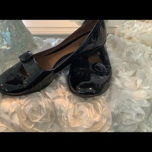 Black patent leather Mary Janes